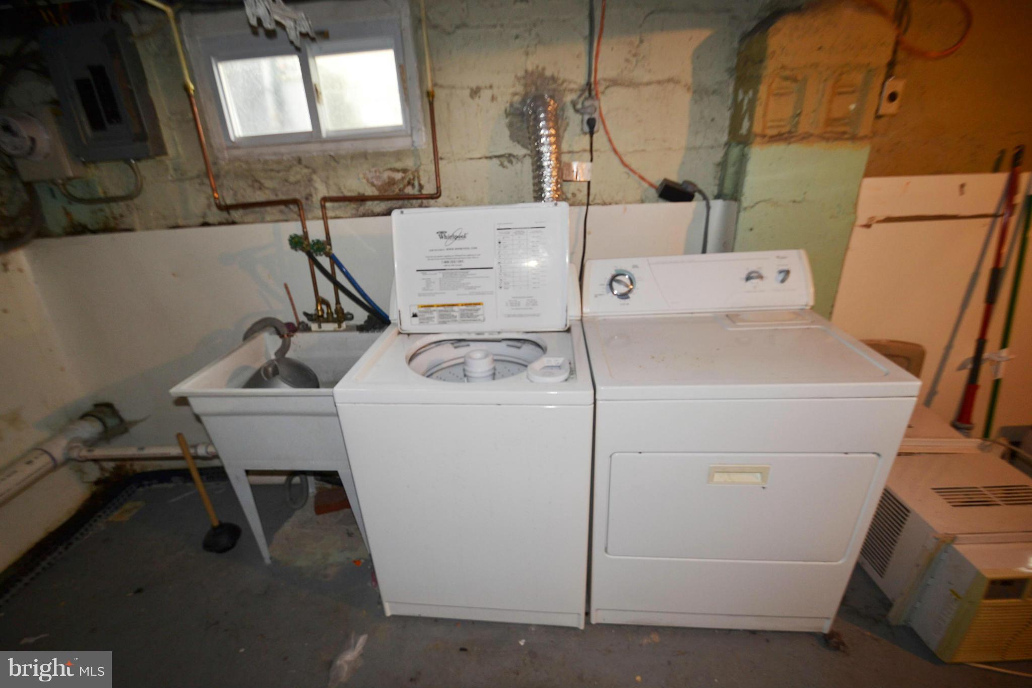 3211 Rosalie Road Baltimore, MD 21227 - Photo 23 of 25 a utility room with dryer and washer