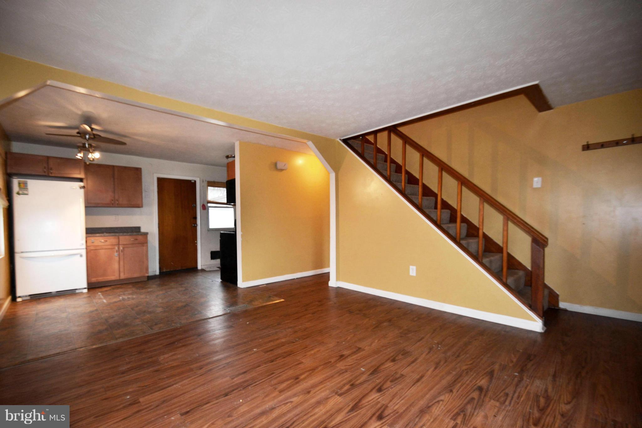 3211 Rosalie Road Baltimore, MD 21227 - Photo 5 of 25 a view of entryway and hall with wooden floor