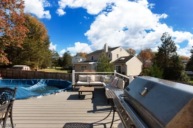 an aerial view of a house with outdoor space