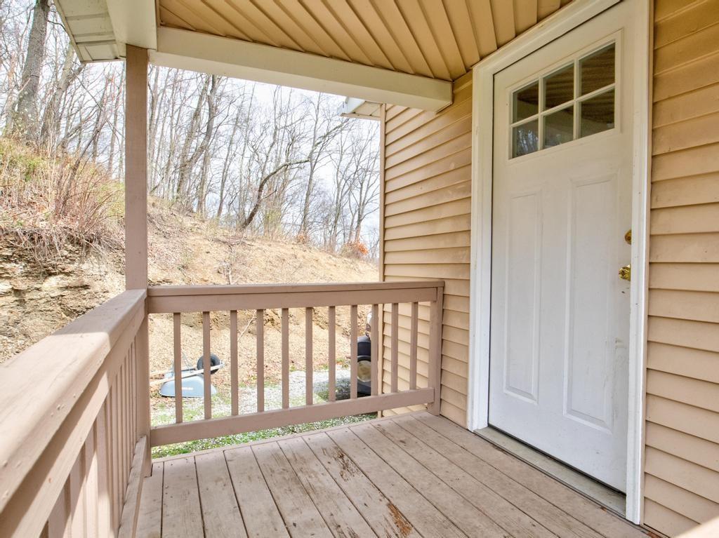 116 Riverview Avenue Aliquippa, PA 15001 - Photo 21 of 28 a view of wooden balcony with a swing