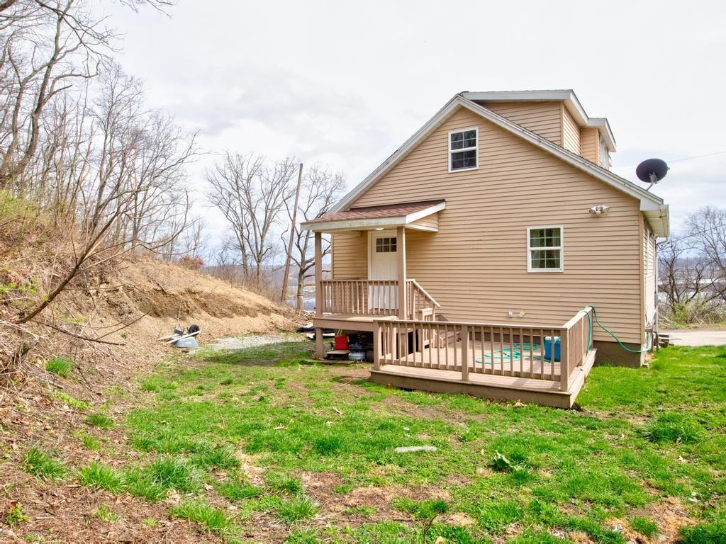 116 Riverview Avenue Aliquippa, PA 15001 - Photo 25 of 28 a front view of a house with a yard