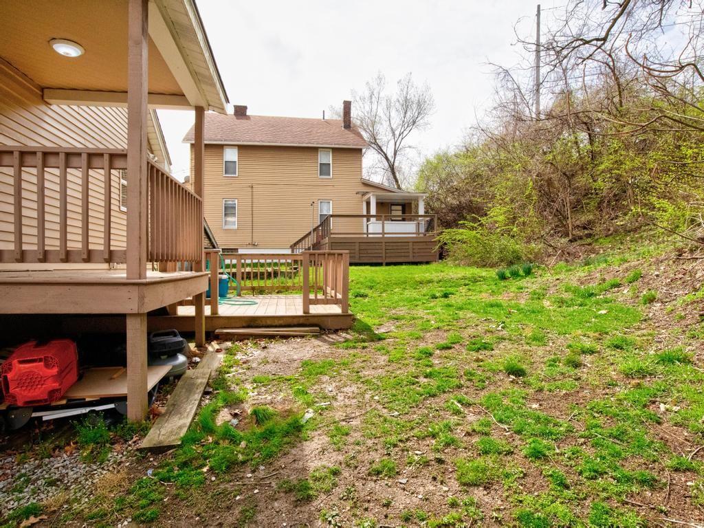 116 Riverview Avenue Aliquippa, PA 15001 - Photo 26 of 28 a view of a house with backyard and sitting area