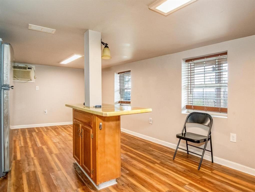 116 Riverview Avenue Aliquippa, PA 15001 - Photo 4 of 28 a view of a room with wooden floor and a sink