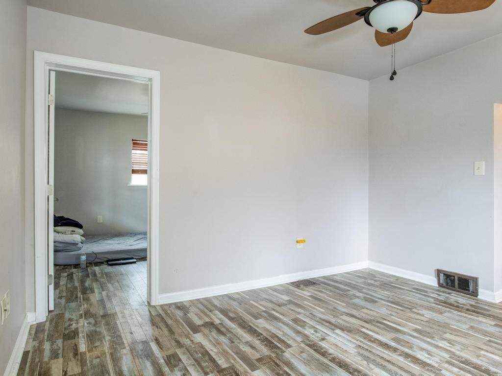116 Riverview Avenue Aliquippa, PA 15001 - Photo 9 of 28 a view of a room with wooden floor and bathroom