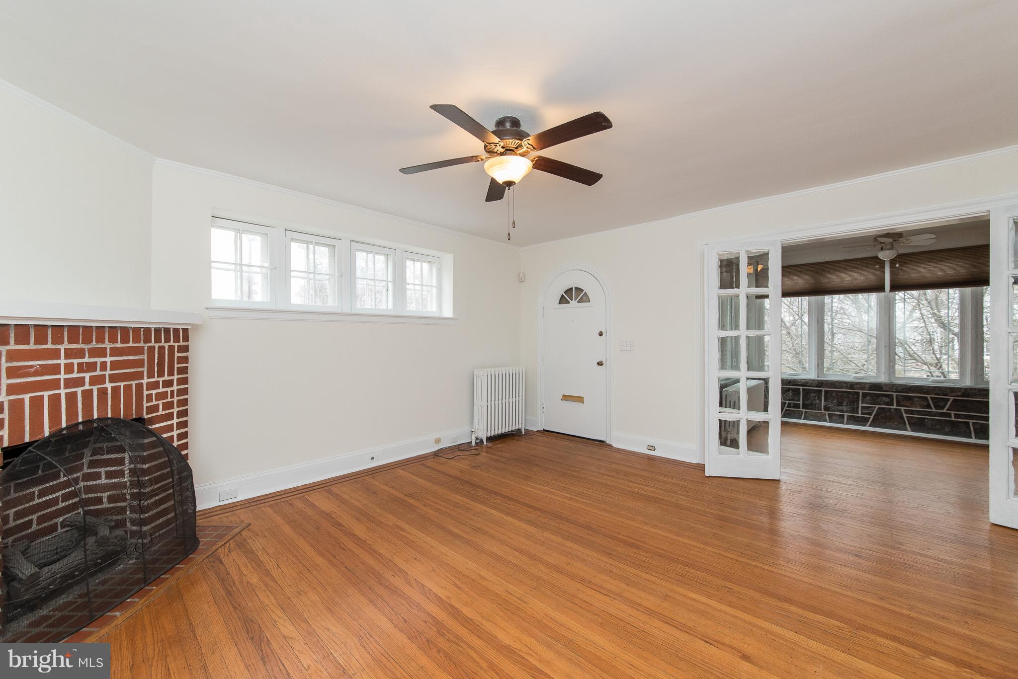 3632 Rexmere Road Baltimore, MD 21218 - Photo 5 of 30 Living Room to Sun Room/Den