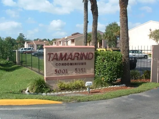 a sign on the side of a road