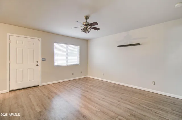 a bathroom with a sink toilet and a mirror