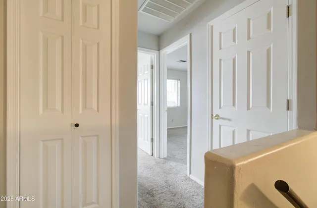 a bathroom with a granite countertop toilet and a shower