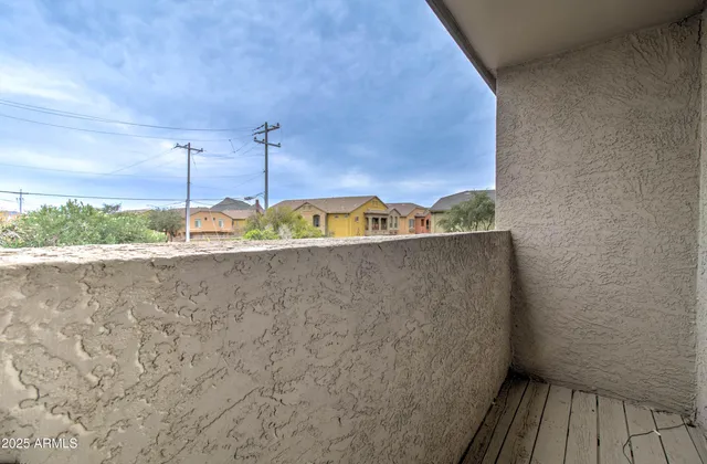 a balcony view with outdoor space