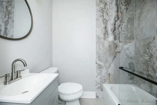 a bathroom with a sink and a toilet