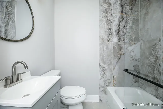 a bathroom with a sink and a toilet