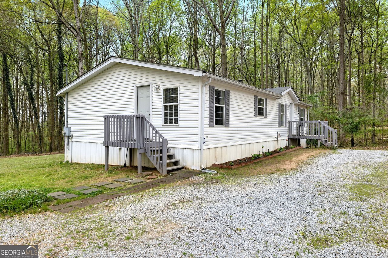 896 Jefferson River Road Jefferson, GA 30549 - Photo 1 of 1 a view of a house with a yard