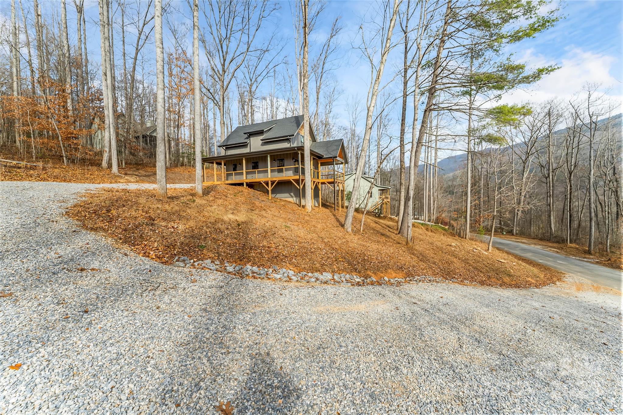 457 Blue Ridge Drive North Marion, NC 28752 - Photo 25 of 34 a view of a house with a yard