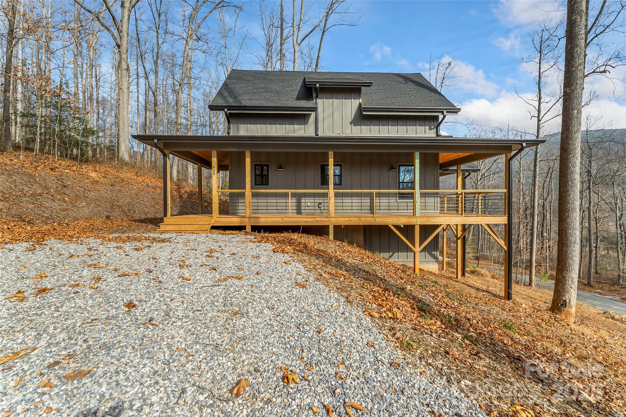 457 Blue Ridge Drive North Marion, NC 28752 - Photo 26 of 34 front view of a house with a yard