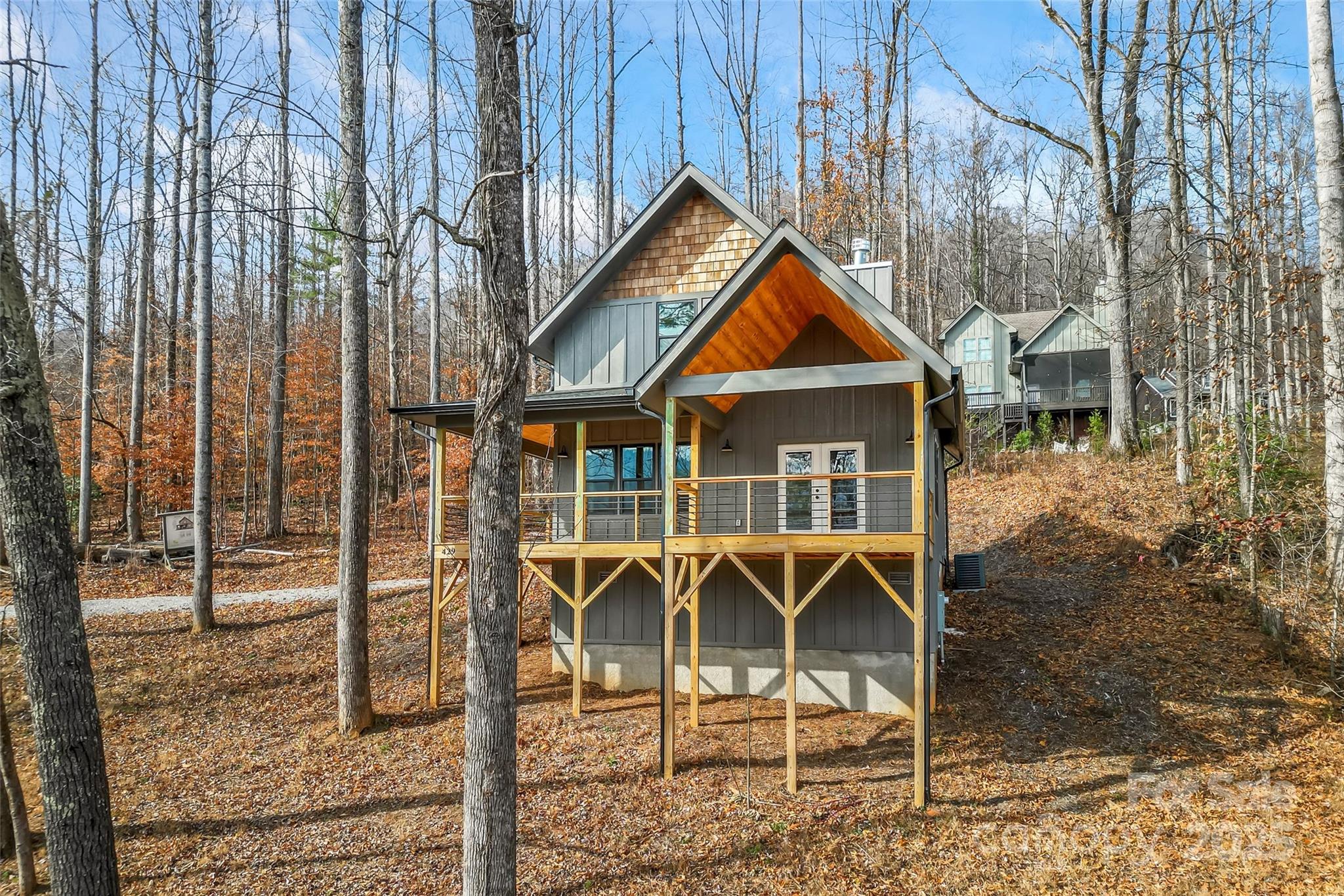 457 Blue Ridge Drive North Marion, NC 28752 - Photo 29 of 34 a front view of a house with table and chairs
