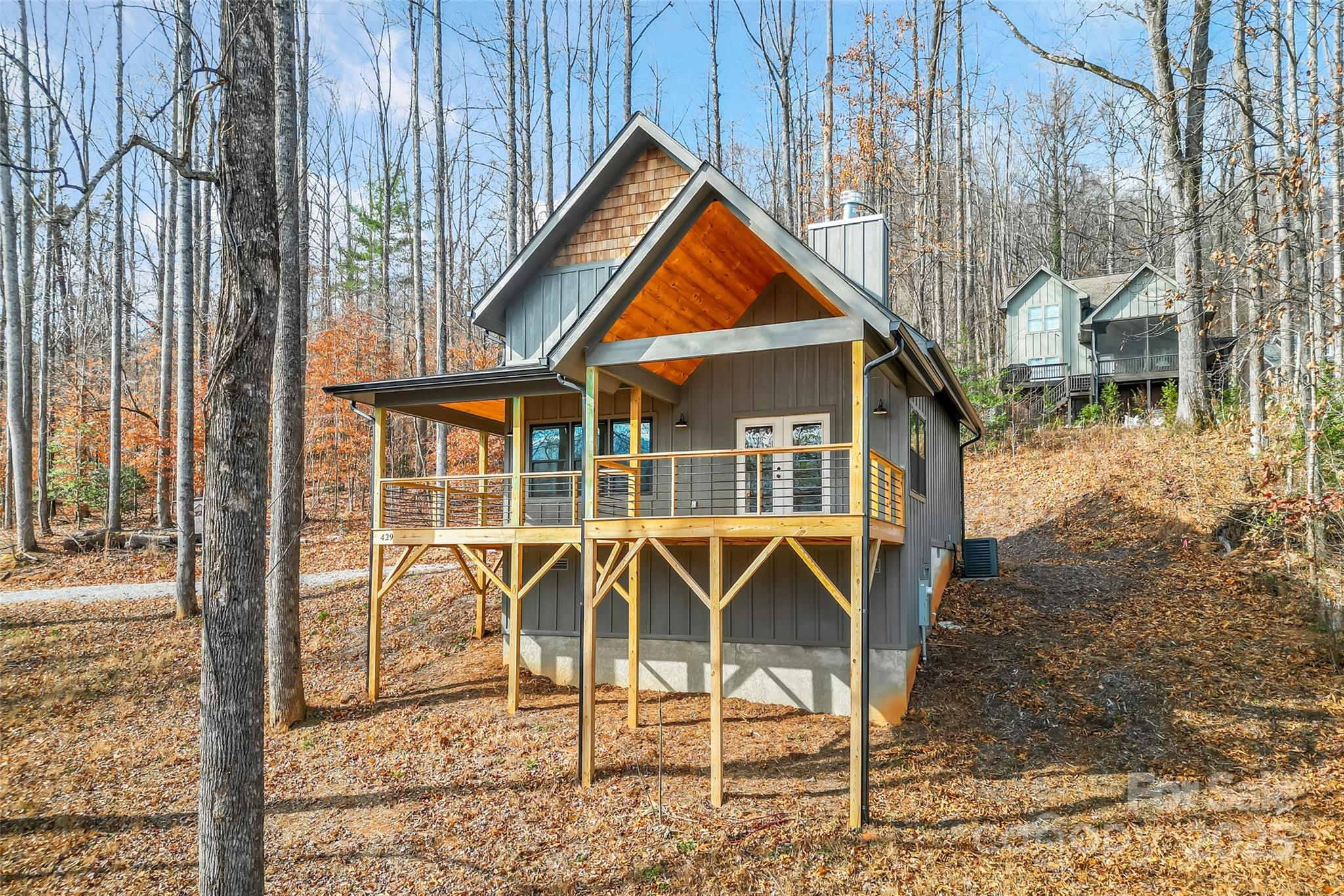 457 Blue Ridge Drive North Marion, NC 28752 - Photo 4 of 34 a view of a house with yard and sitting area