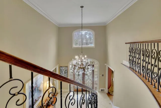 a bathroom with a granite countertop sink toilet tub and shower