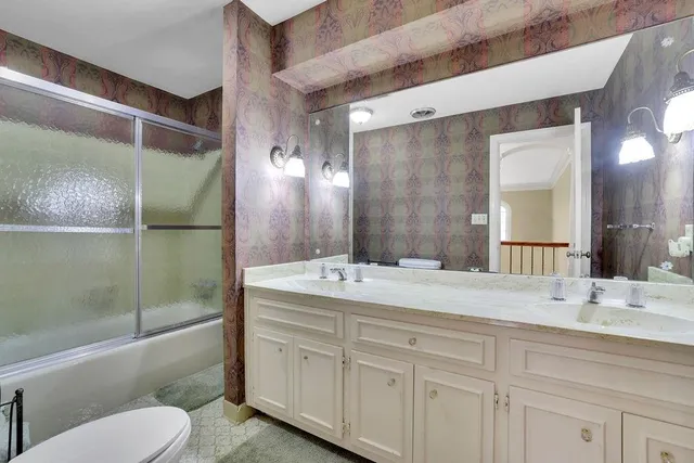 a living room with granite countertop furniture and a large window