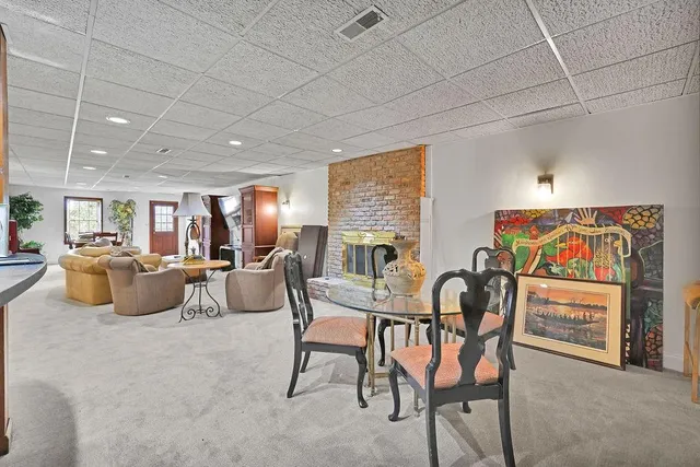 a view of a house with snow in the yard