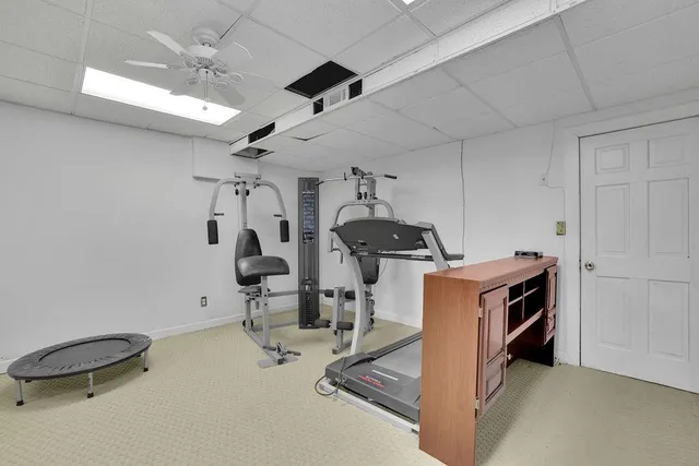 a backyard of a house with large trees