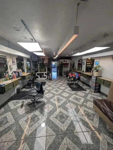 a living room with furniture gym equipment and a view of living room