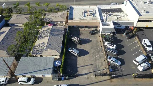 an aerial view of a house with patio