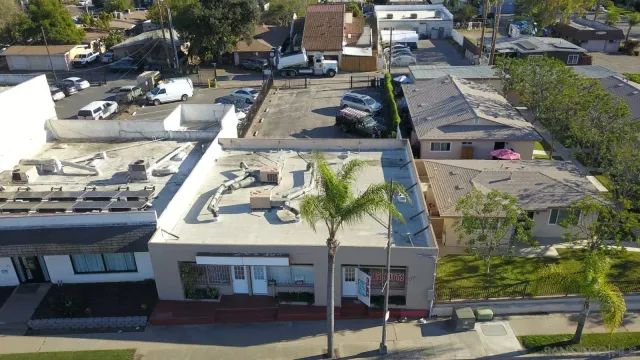 a view of a dinning table and chairs in the patio
