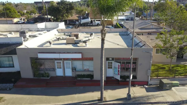 a view of a car park in front of building