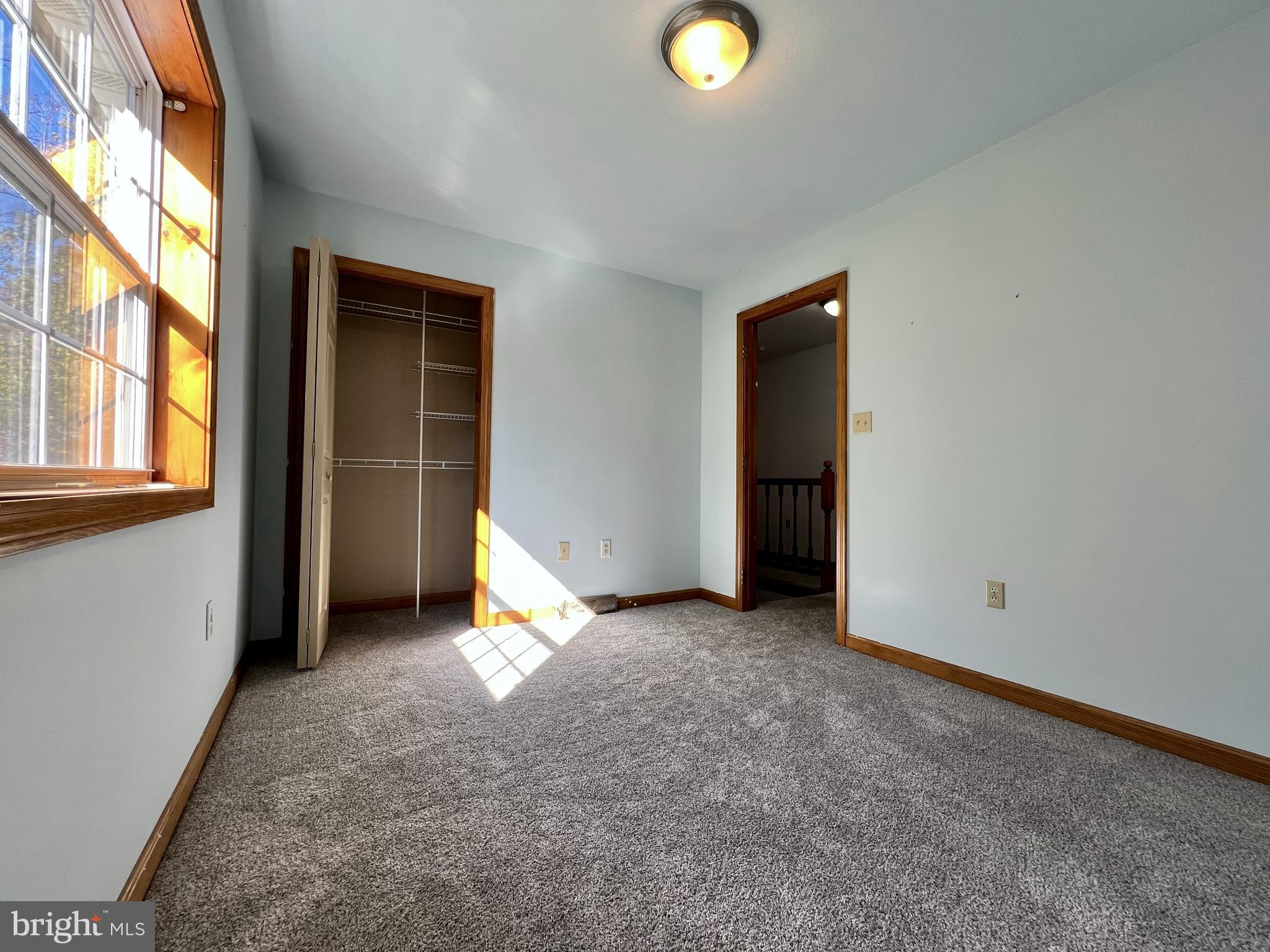 179 Sylvan Heights Road Du Bois, PA 15801 - Photo 17 of 40 an empty room with windows and closet