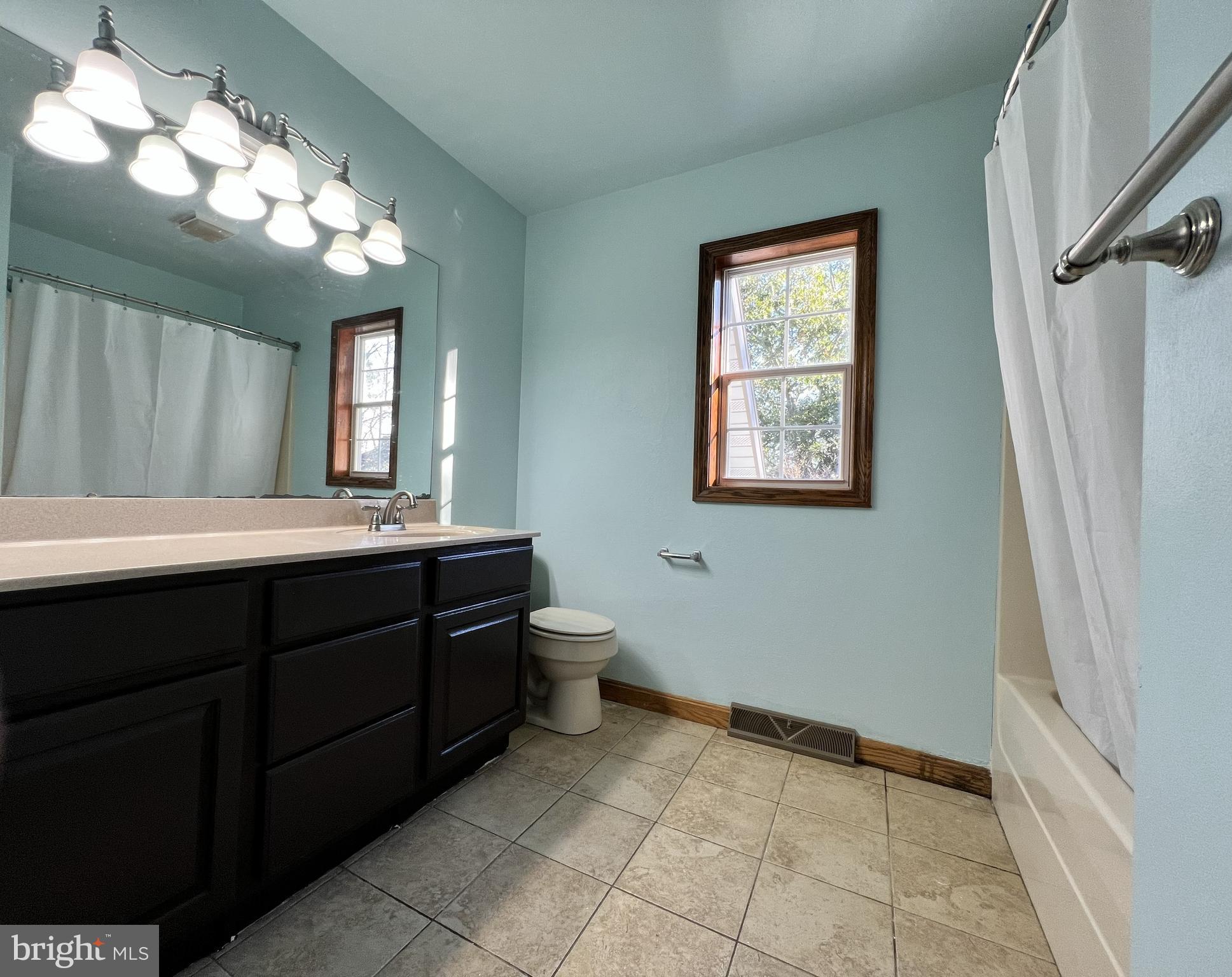 179 Sylvan Heights Road Du Bois, PA 15801 - Photo 19 of 40 a bathroom with a toilet sink and mirror