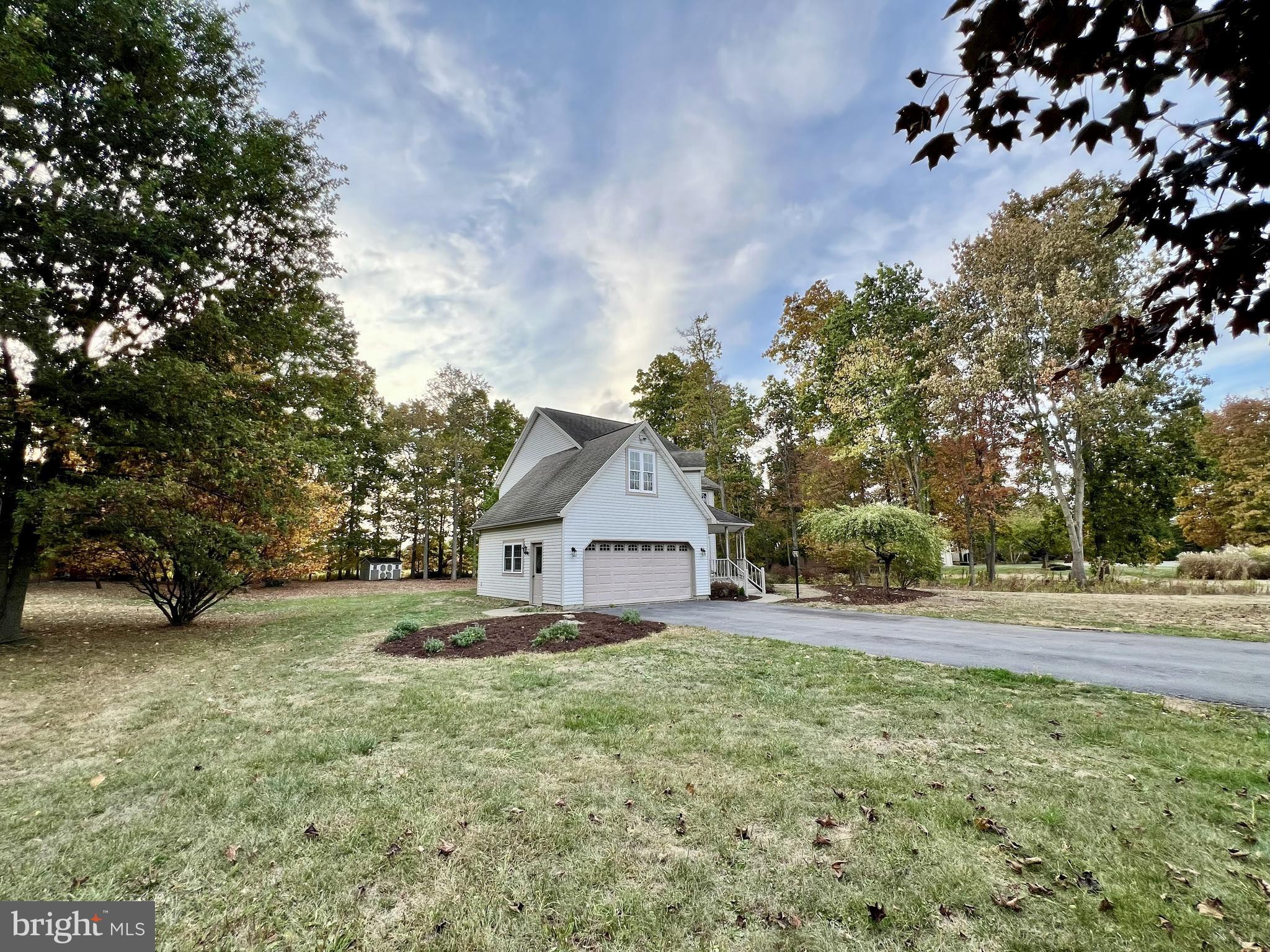179 Sylvan Heights Road Du Bois, PA 15801 - Photo 2 of 40 a view of a house with a yard and large trees