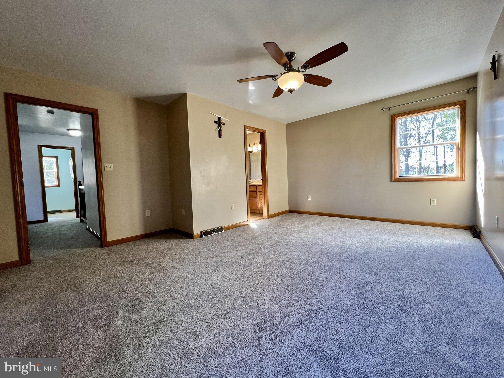 179 Sylvan Heights Road Du Bois, PA 15801 - Photo 21 of 40 a view of a livingroom with a ceiling fan and window