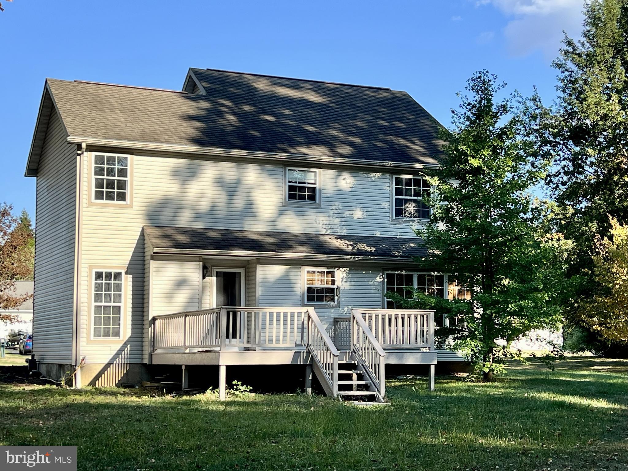 179 Sylvan Heights Road Du Bois, PA 15801 - Photo 33 of 40 a view of a house with a deck and a garden