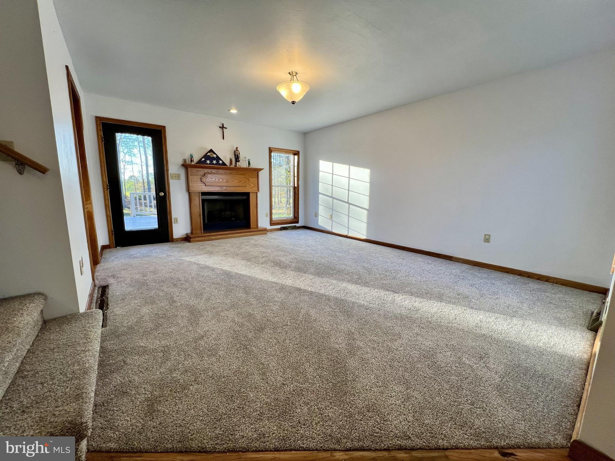 179 Sylvan Heights Road Du Bois, PA 15801 - Photo 5 of 40 a view of a livingroom with a fireplace