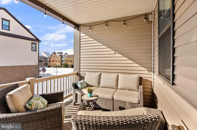 a bedroom with a bed and a ceiling fan