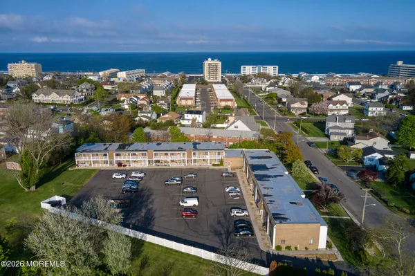 a view of swimming pool with a yard