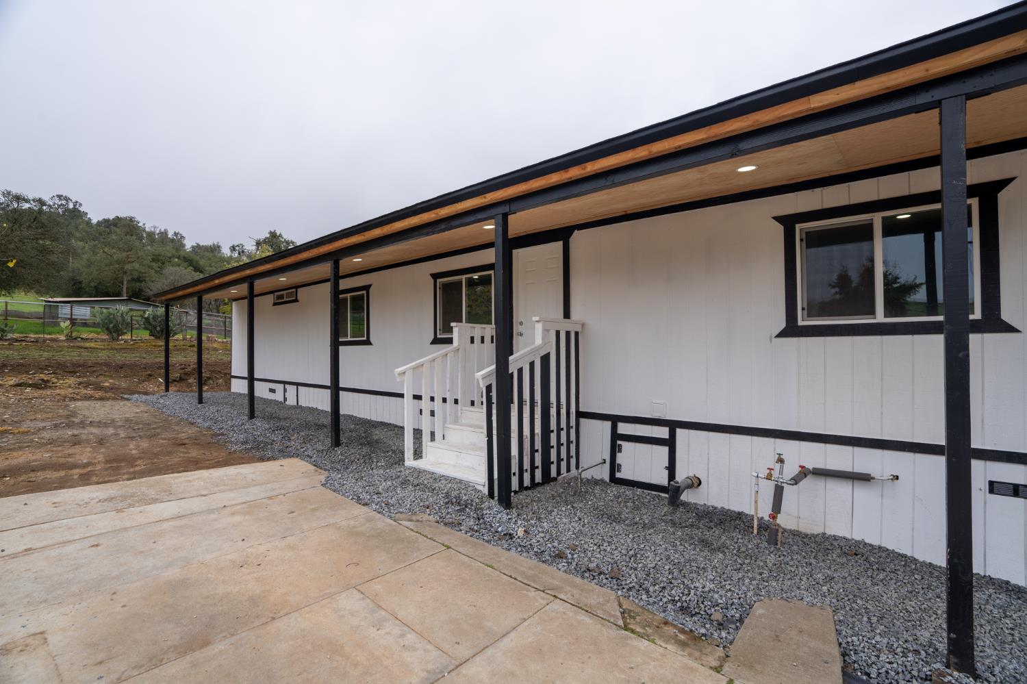 36712 Pebble Lane Squaw Valley, CA 93675 - Photo 4 of 17 a house view with a backyard space