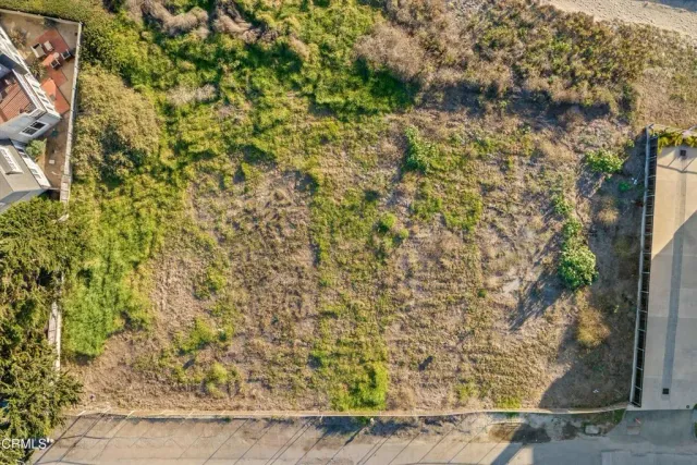 a view of an ocean and mountain