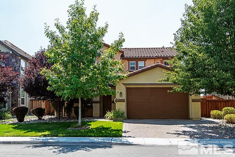 11115 Parma Way Reno, NV 89521 - Photo 1 of 1 a front view of a house with garden