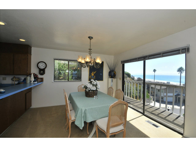 101 Vía Concha Aptos, CA 95003 - Photo 4 of 9 a view of a dining room with furniture window and outside view