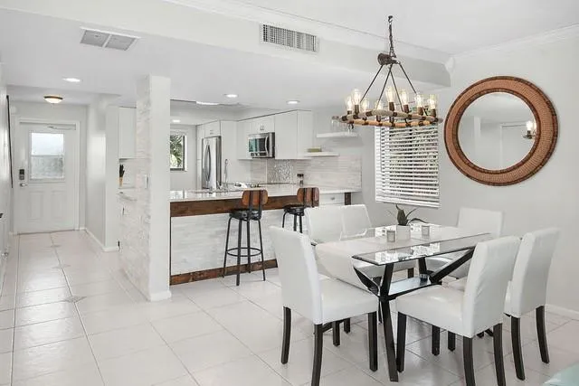 a view of a dining room with furniture