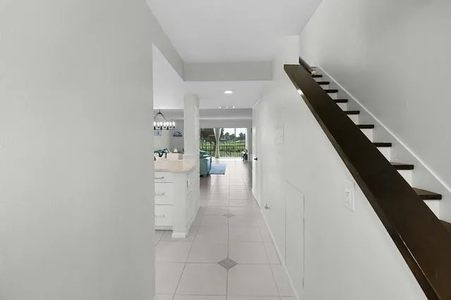 wooden floor with white walls