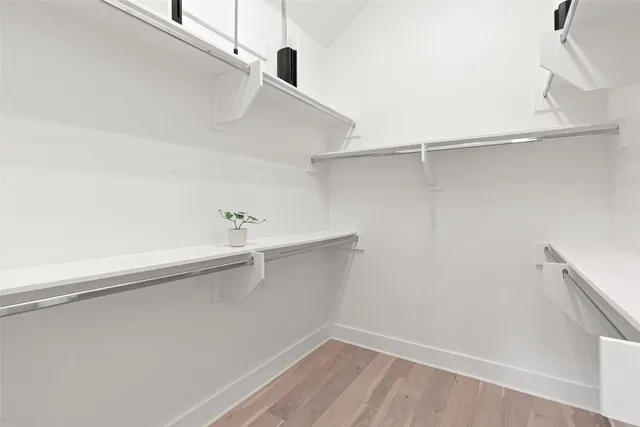 a view of an empty walk in closet