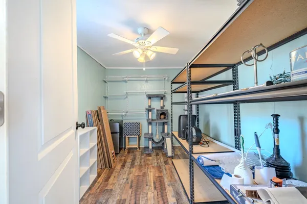 a view of dining room with furniture and wooden floor