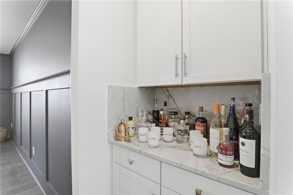 9872 Ashton Old Road Douglasville, GA 30135 - Photo 23 of 62 a kitchen with a refrigerator and cabinets