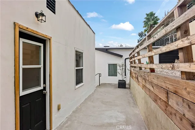 a large white building with kitchen view