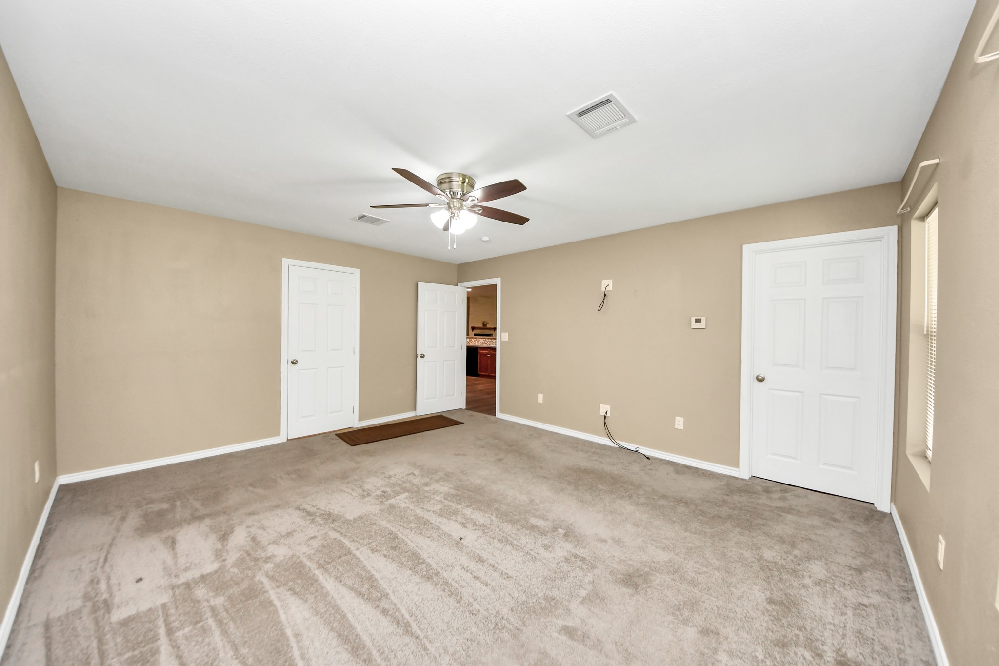 197 County Road 348 Cleveland, TX 77327 - Photo 17 of 48 Primary bedroom