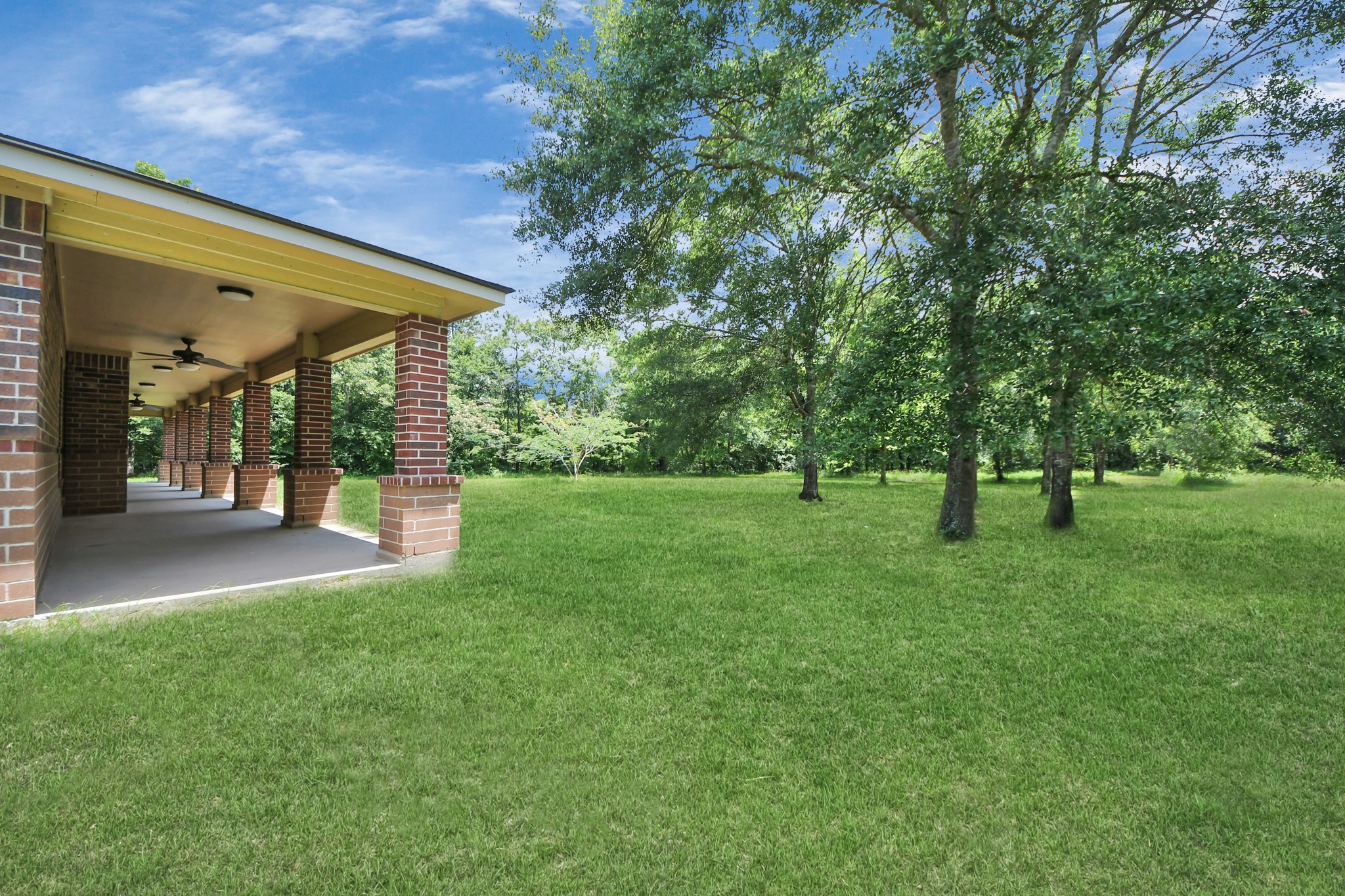 197 County Road 348 Cleveland, TX 77327 - Photo 5 of 48 Front porch side view