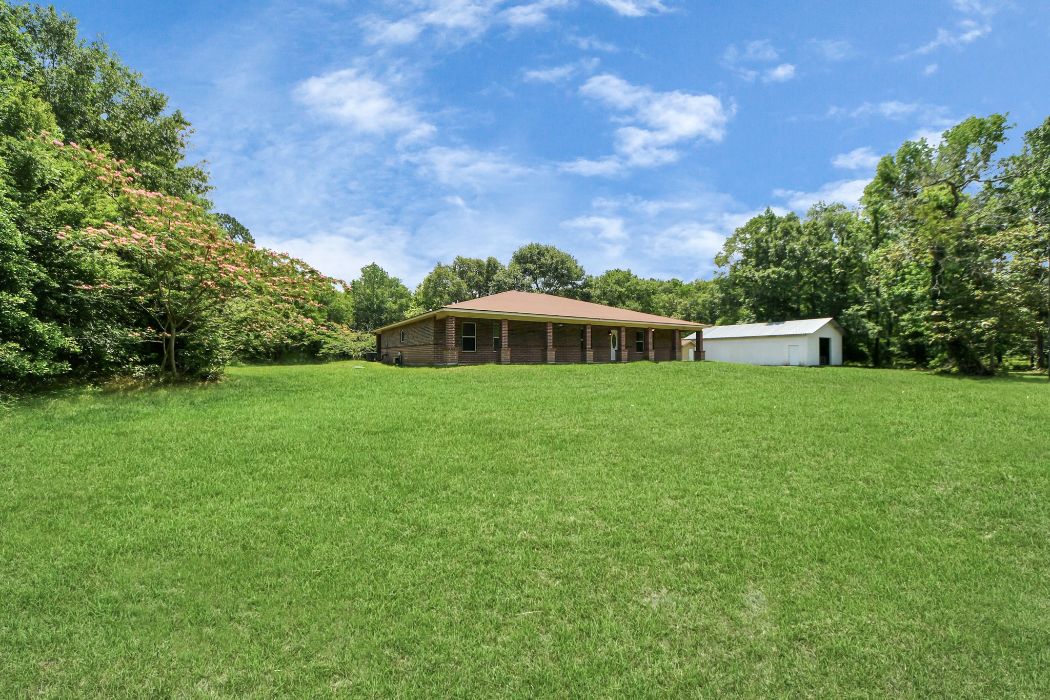 197 County Road 348 Cleveland, TX 77327 - Photo 6 of 48 Main house front side