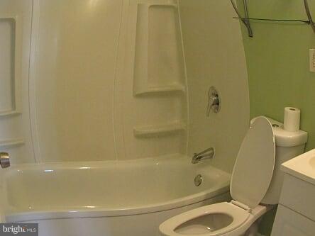 7102 Greenbank Road Baltimore, MD 21220 - Photo 17 of 30 a bath tub sitting next to a toilet